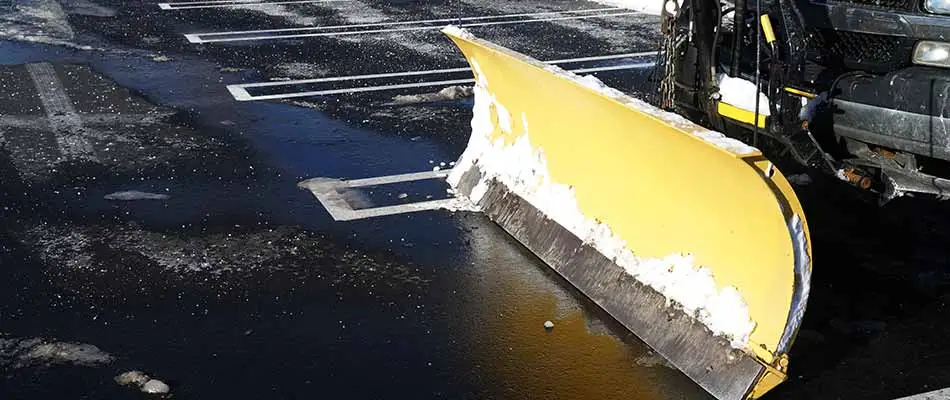 Plow used to remove snow from parking lot in Omaha, NE.