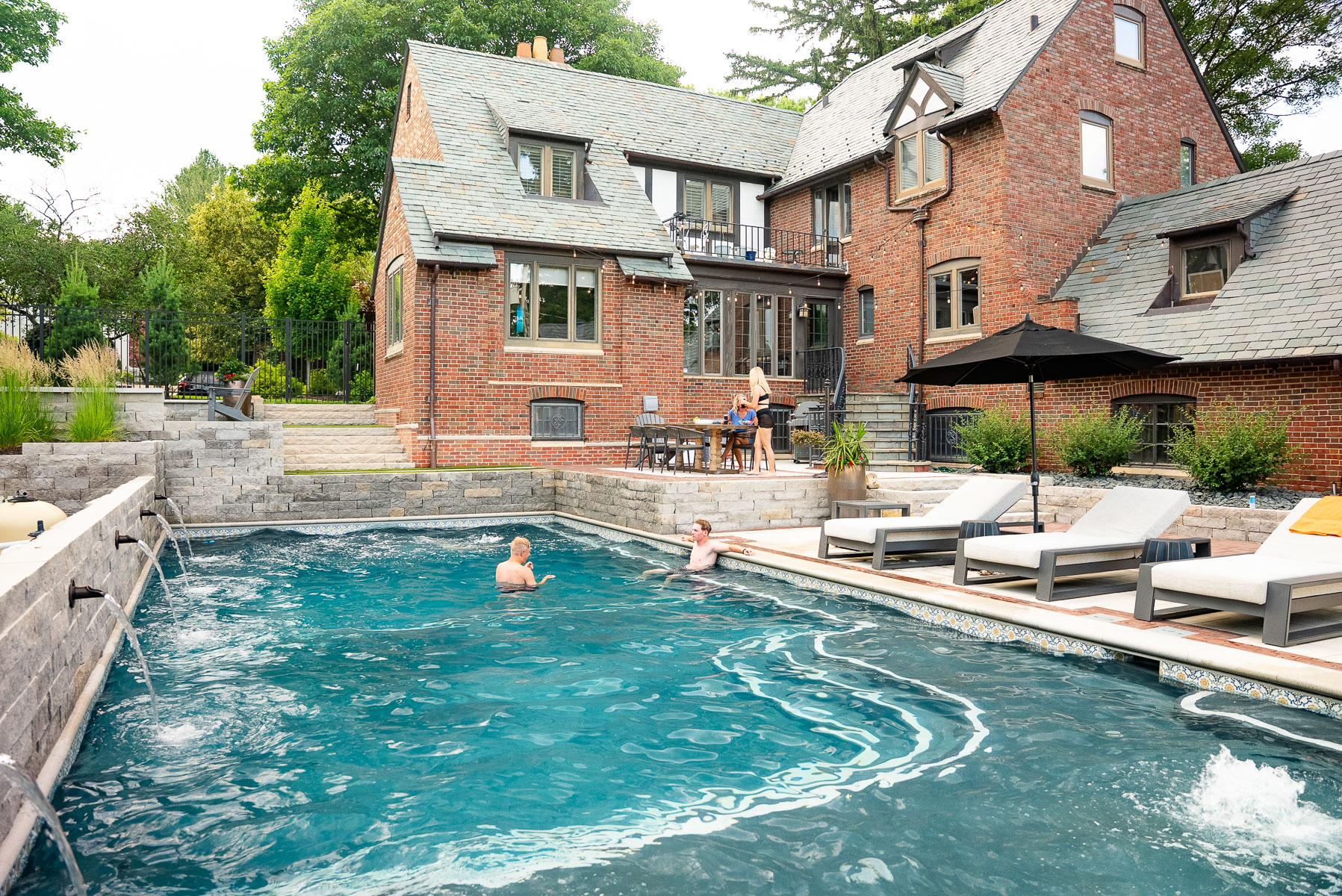 family kids pool swimming party backyard