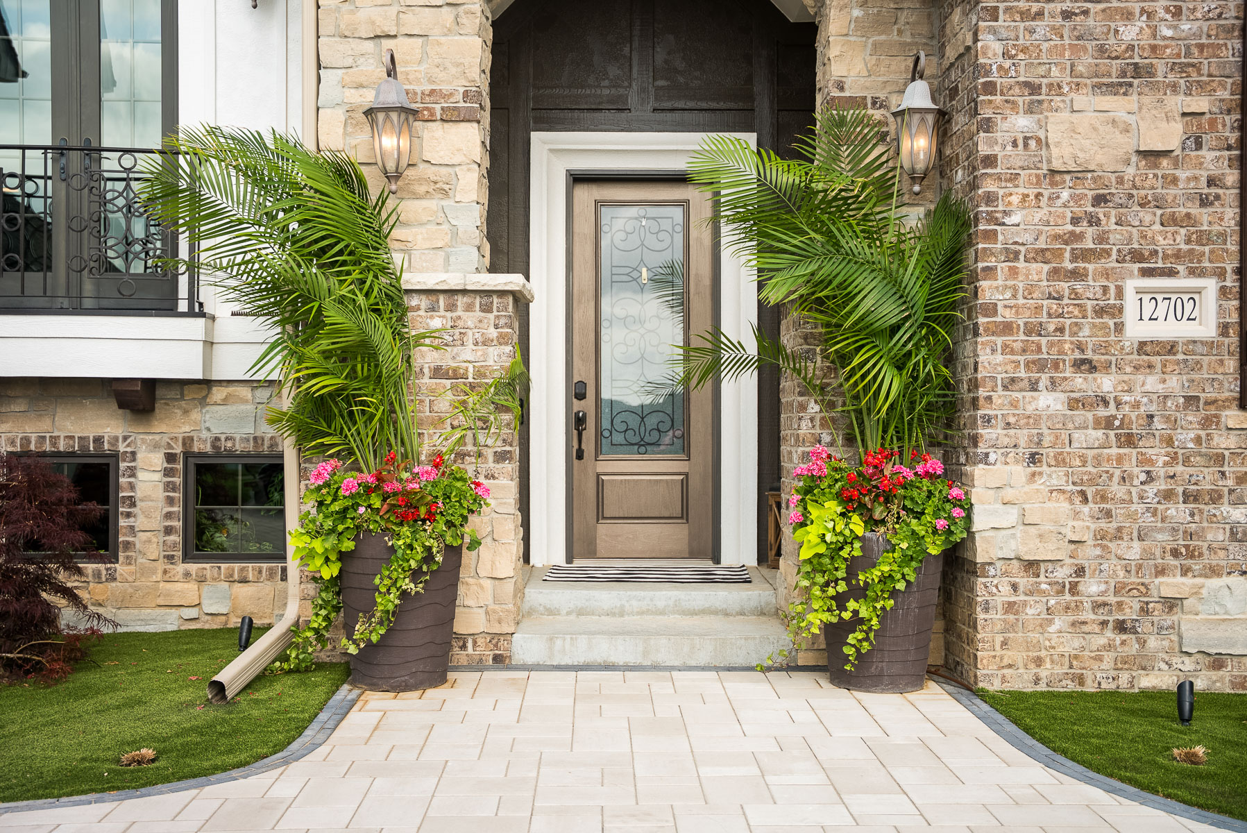 front entrance home annual flower pot