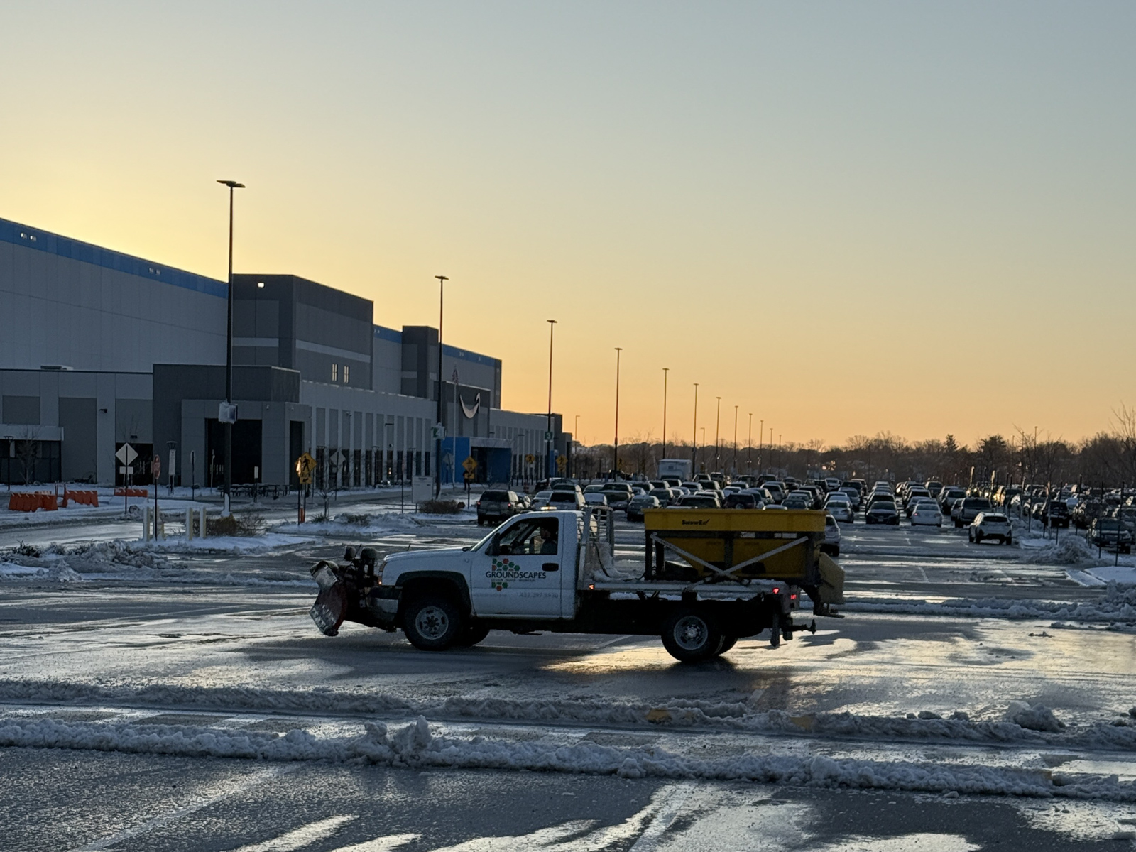 groundscapes truck snow removal amazon warehouse commercial building plow salter