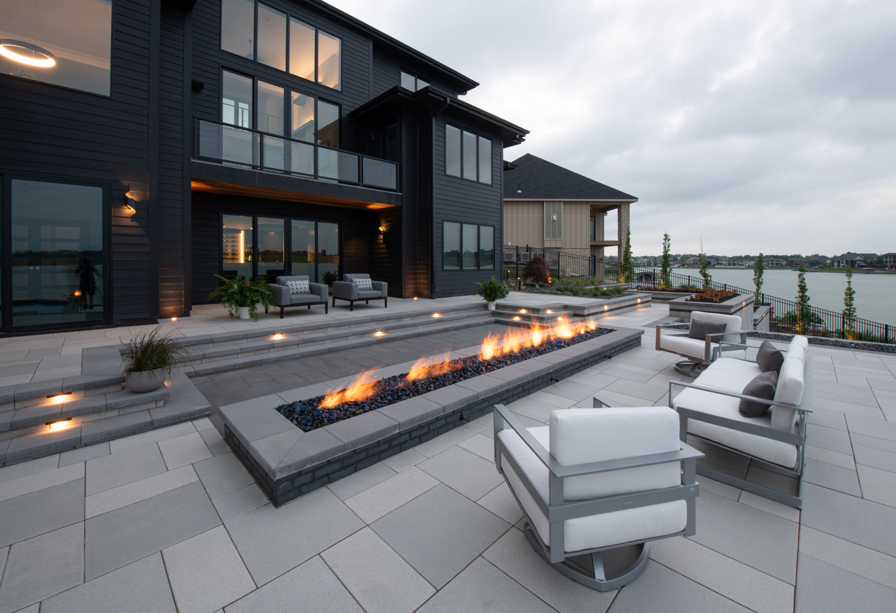 nice firepit gas seating landscapel ighting wall steps stone patio