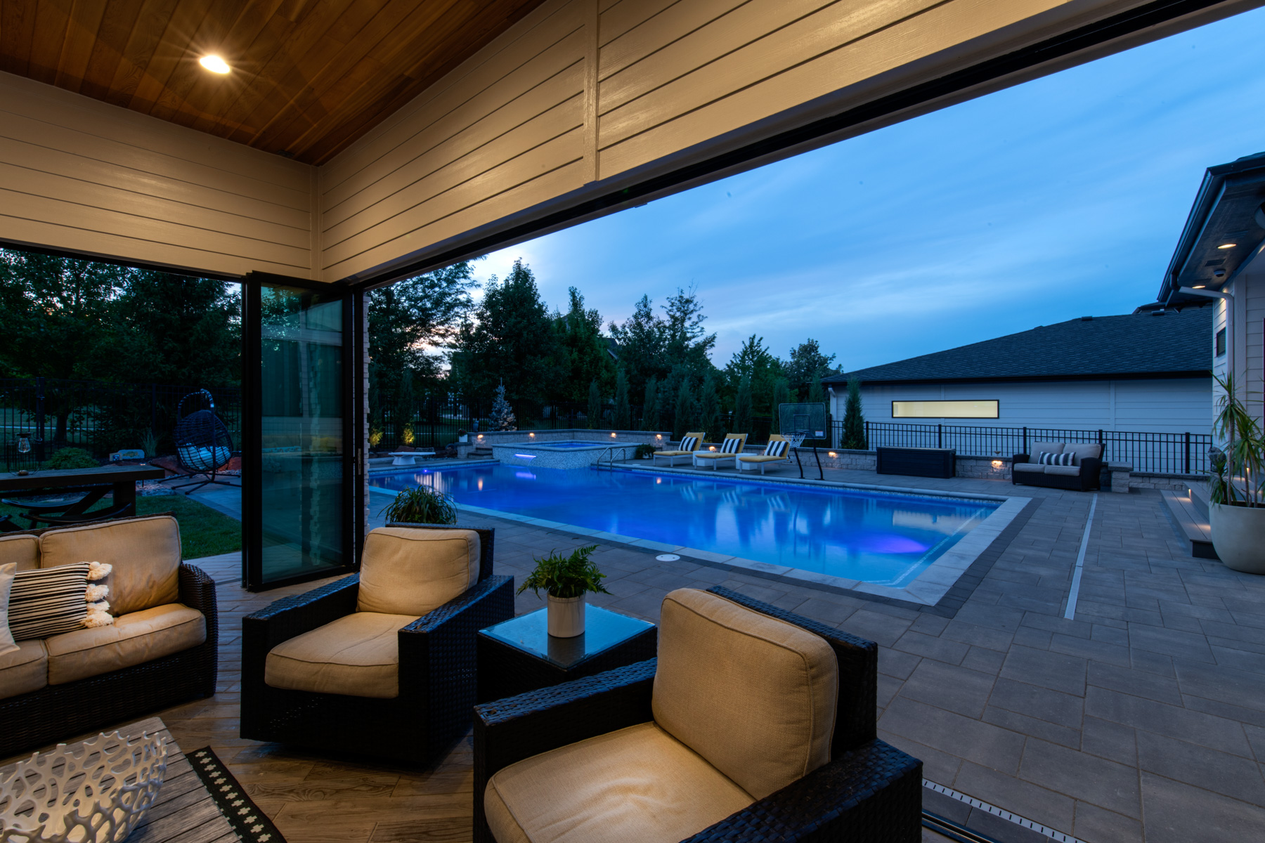 night lights pool seating covered patio